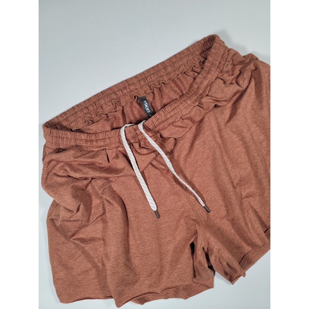 Vuori Women's Athletic Shorts in Rust